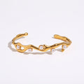 peal and gold bracelet