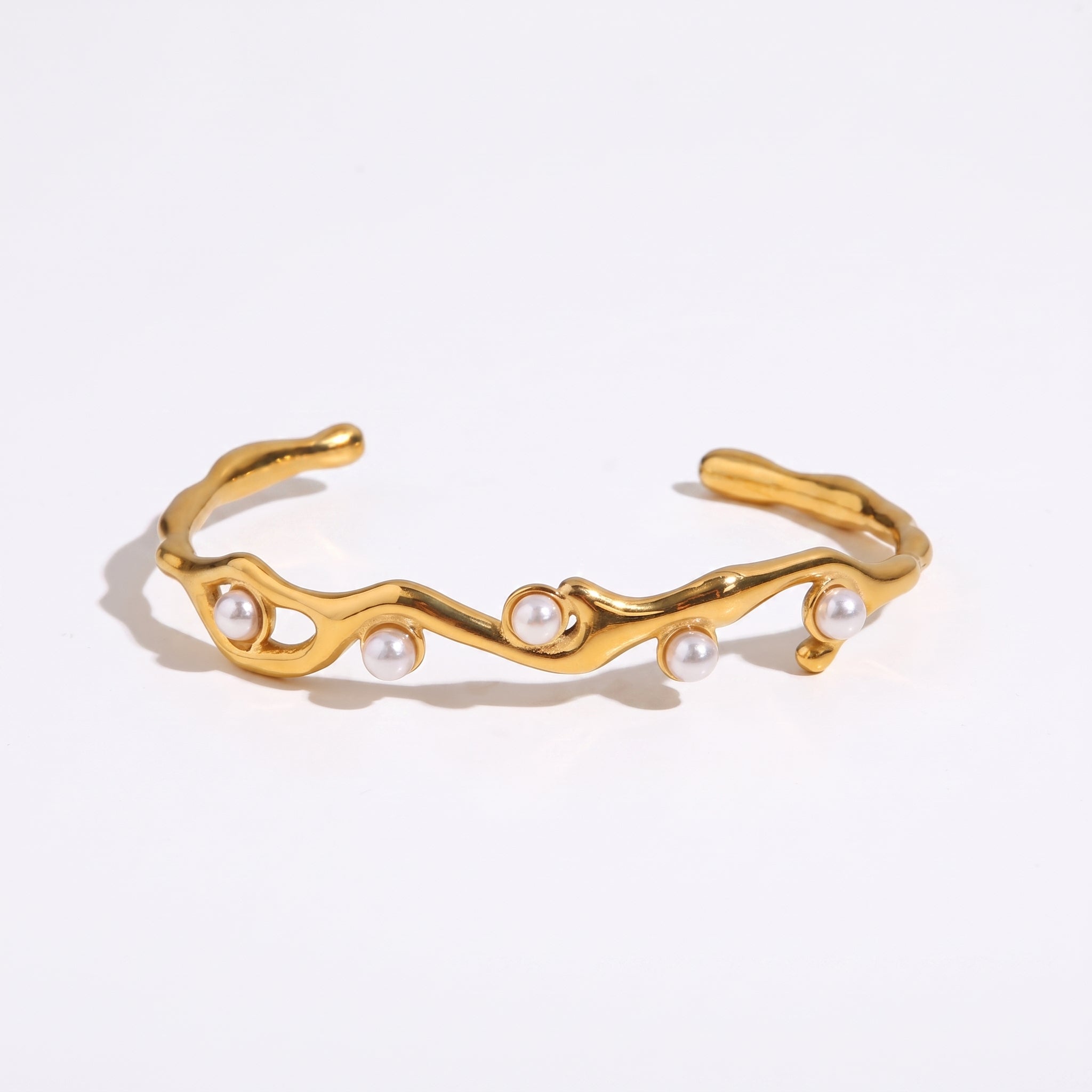 peal and gold bracelet